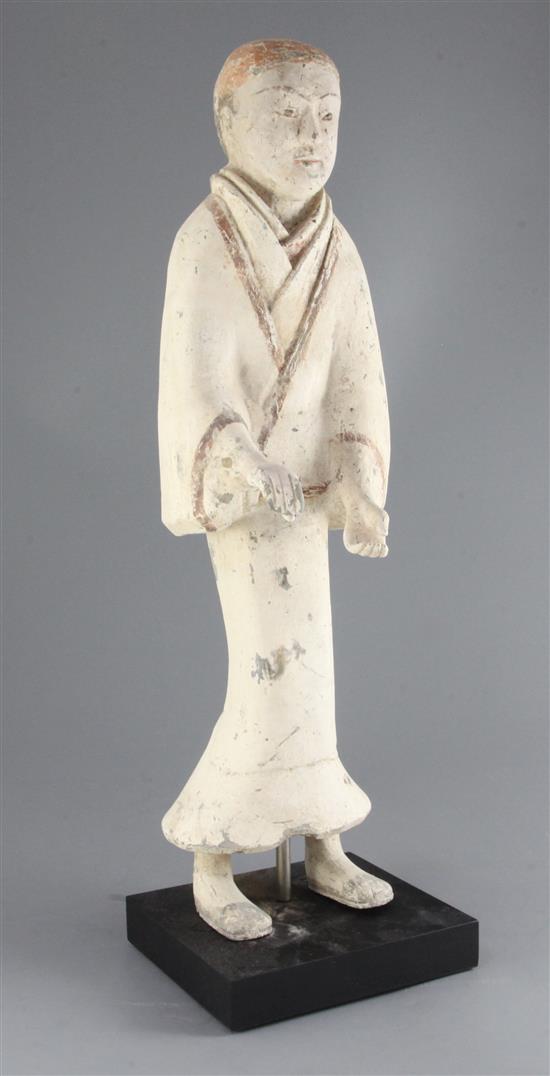 A tall Chinese pottery figure of a Court Attendant, Xian, Western Han dynasty (206BC - 8AD) 57.5cm, modern stand